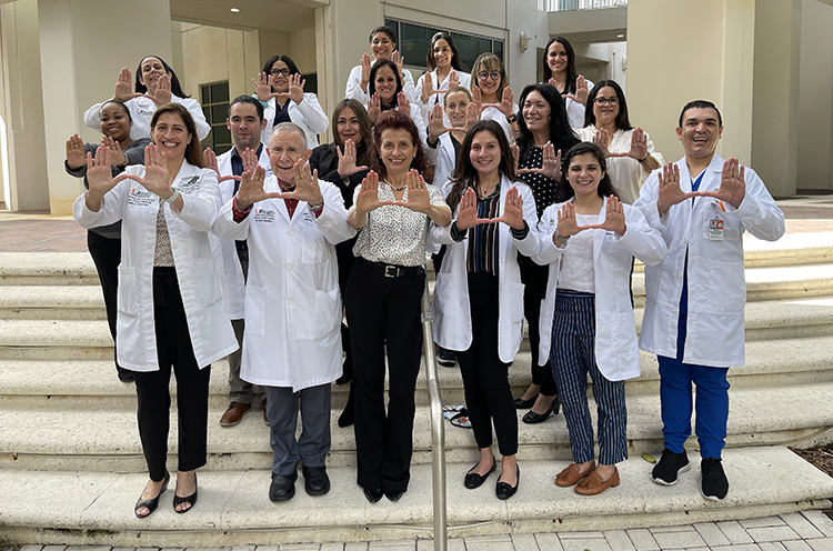 Clinical research team at the Schiff Center. Front row left to right: Dr. Cynthia Levy, Dr. Eugene Schiff, Sonia Carvalho, Barbara Mera, Reyna Segovia, Edgar Medina. Second row: Lleandra Diaz, Luis Cuza, Wendy Romero, Patricia Blenet, Sandra Dostaler, Niurka Montenegro. Third row: Emilia Rodriguez, Malia Avila, Diane Sabogal, Gledys Martinez, Julie de Leon. Last row: Katheryn Dae and Maria Onate. 