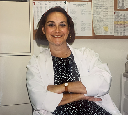 Carmen Fuente sitting in an office