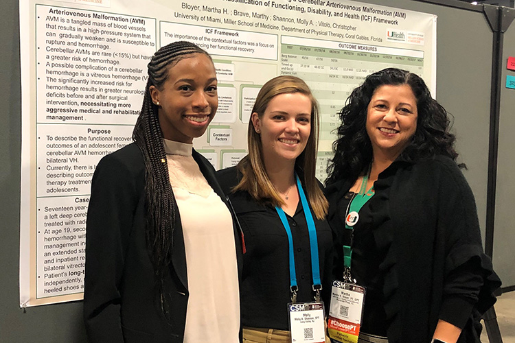 Presenters posing with their research