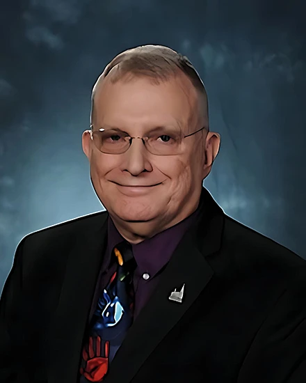 Michael E. Mahla, M.D.