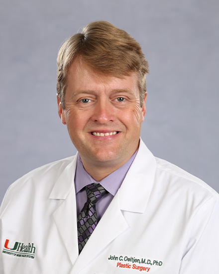 John C Oeltjen, M.D., Ph.D.