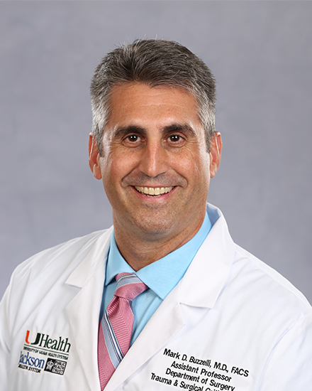 Mark Buzzelli, M.D.