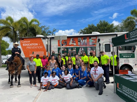 Summer students engaging in outreach