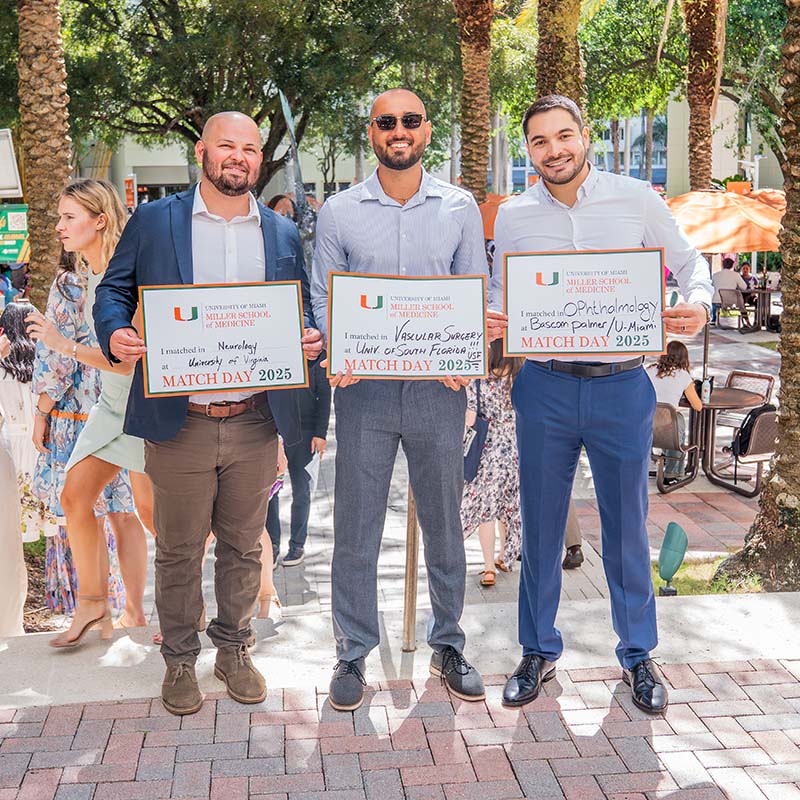 three men celebrate at Match day 2025