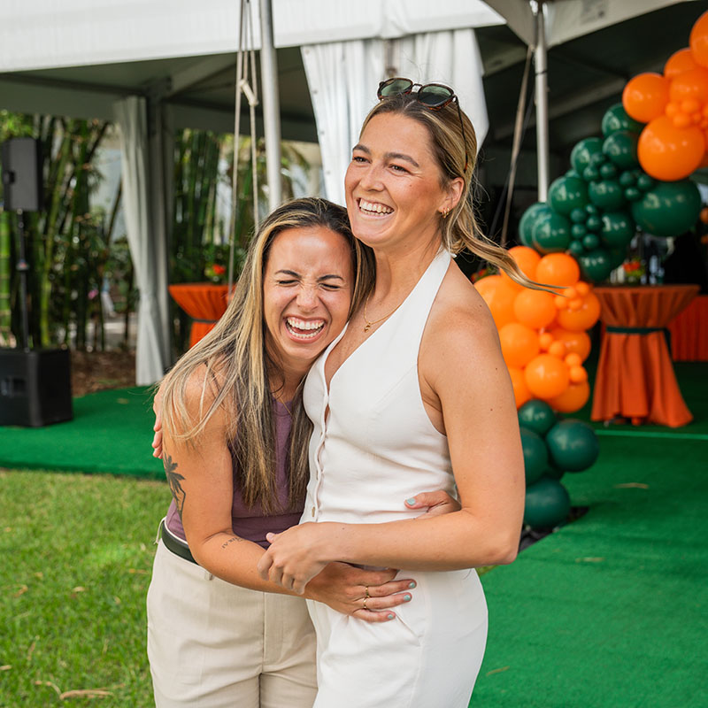 two women celebrate at match day 2025