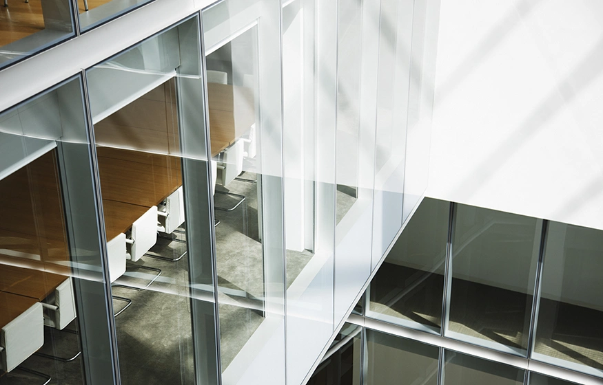Glass walls in atrium of office building