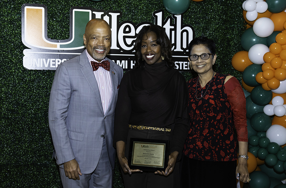Dean ford standing with award recipient