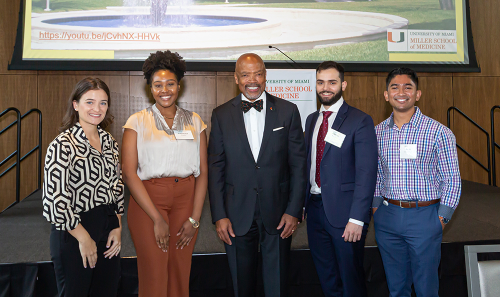 Dean Ford with four colleagues