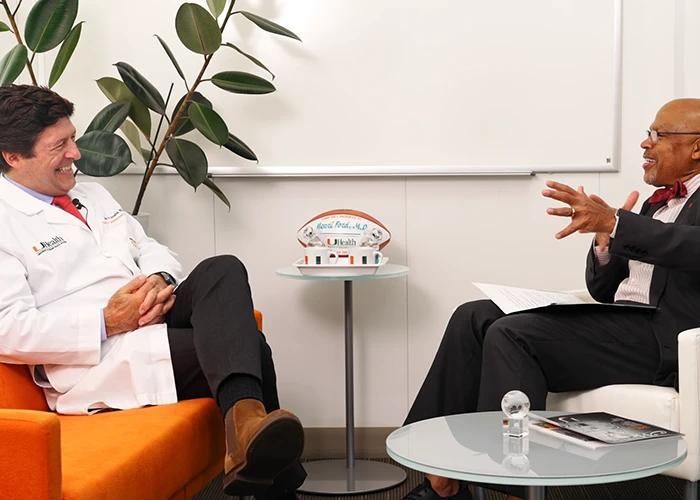 dr. u speaking at the podcast