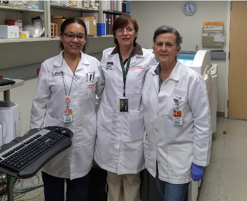 Faculty pose for a photo at the Biomarker & Immunoassay Lab
