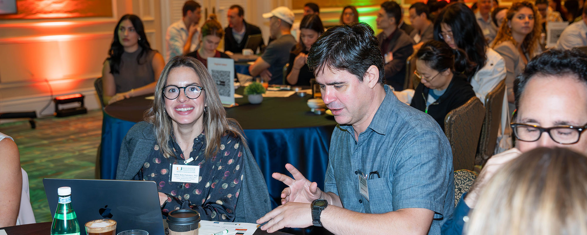 Researchers in a conference room at the cancer epigenetics conference