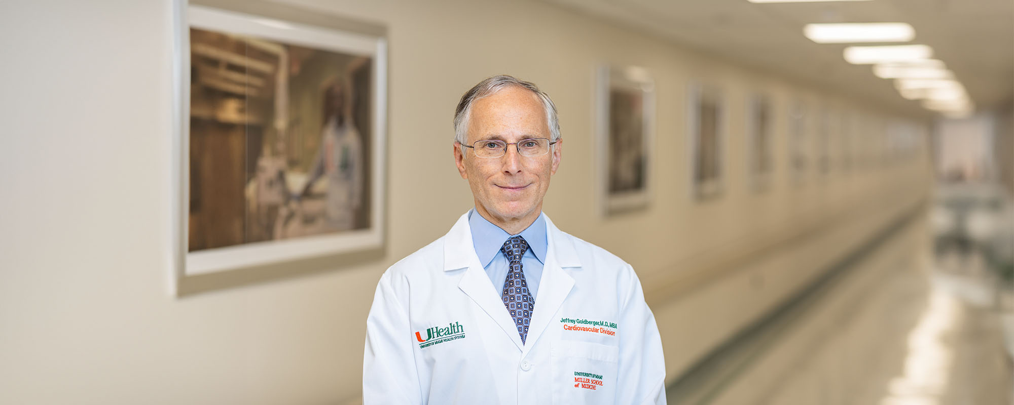 Dr. Jeffrey Goldberger in white clinic coat