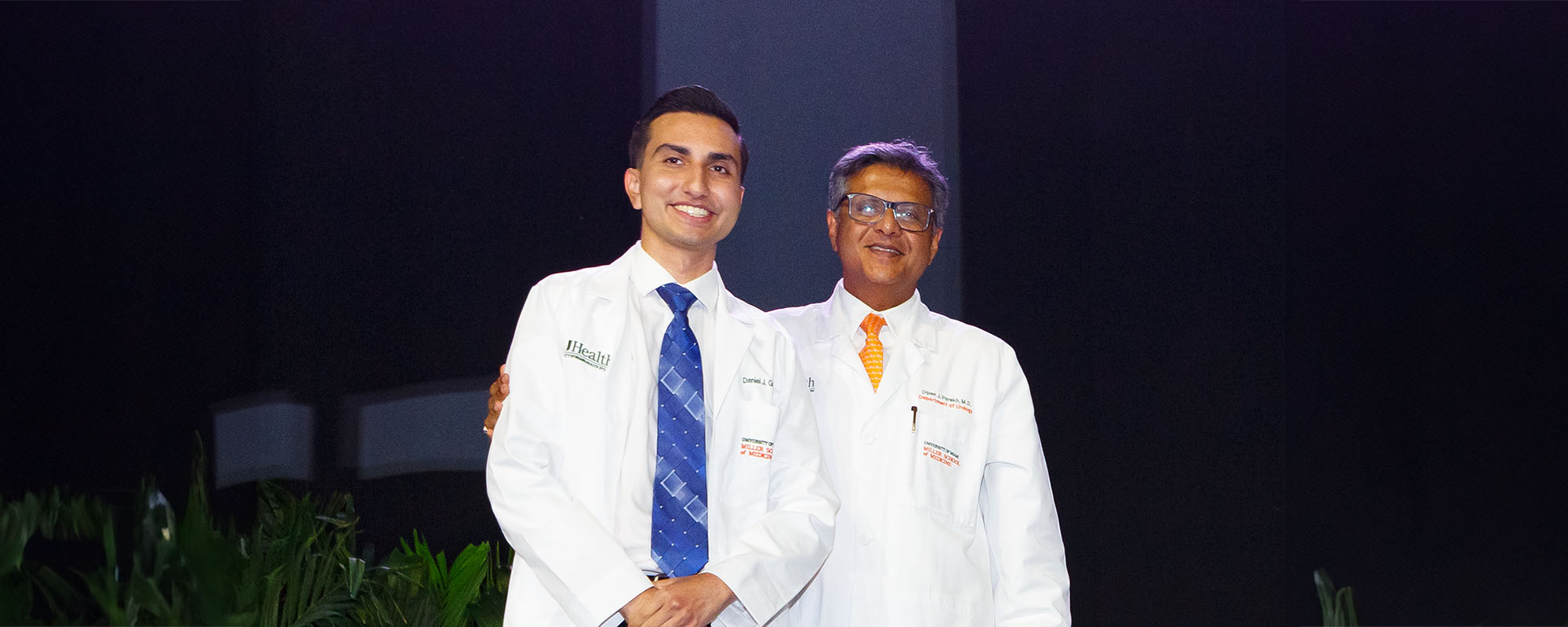 Medical student Daniel Groso with Dr. Dipen Parekh at the Miller School white coat ceremony