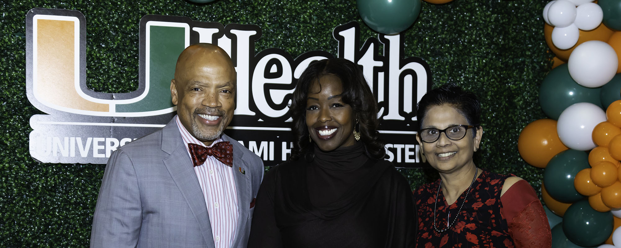 Dean Henri Ford and Dr. Latha Chandran with a LEAD graduate